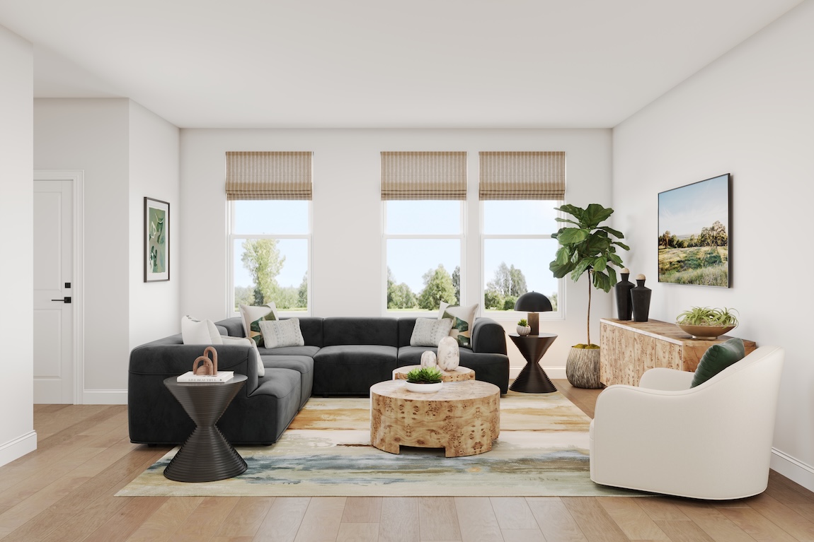 modern great room with black sofa and natural light