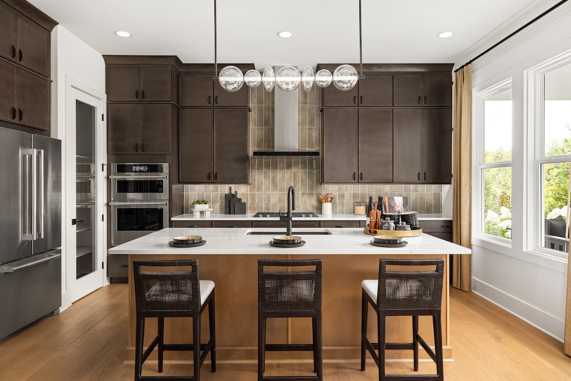 modern kitchen with hazelnut cabinetry.