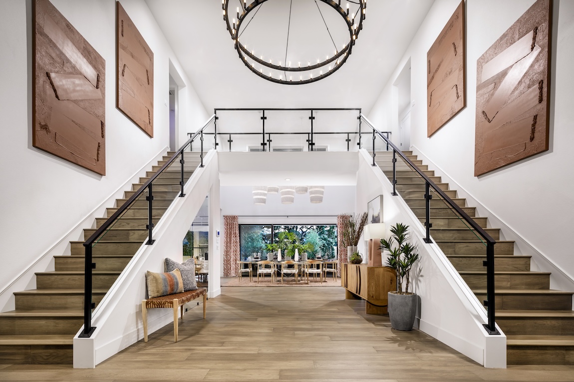 modern entryway with dual staircase