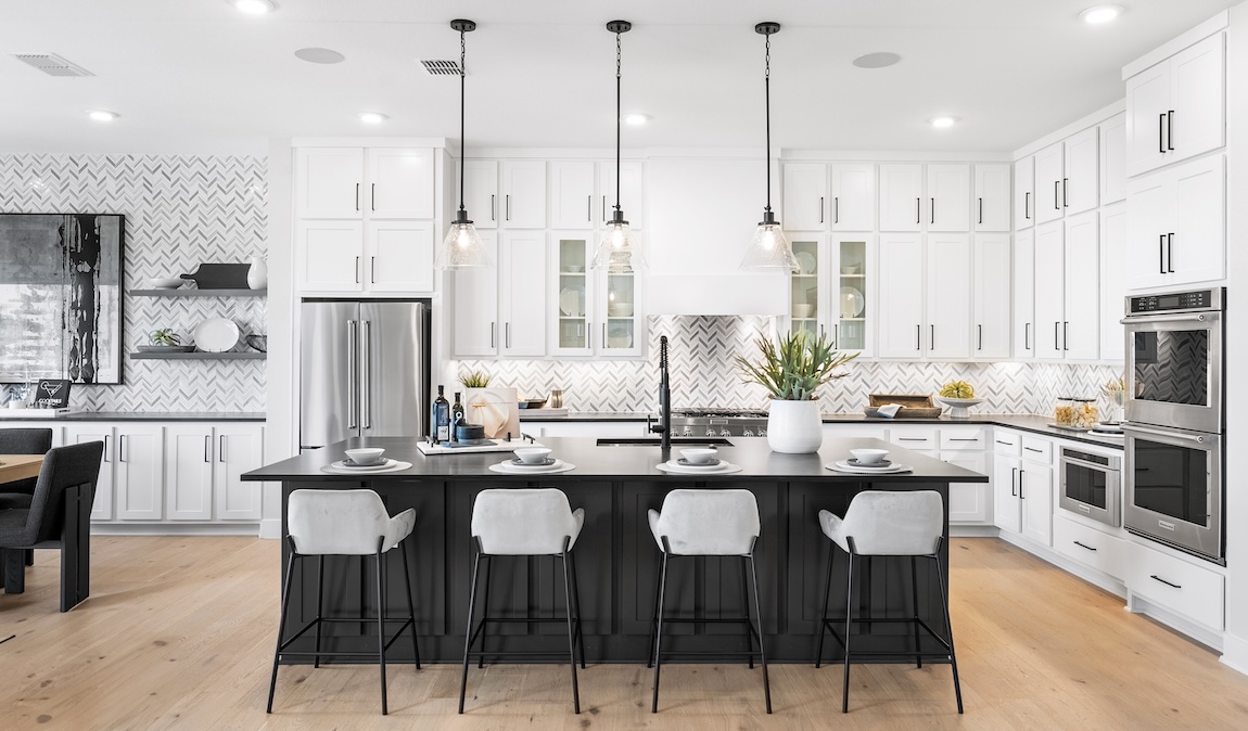 modern kitchen with creative backsplash.