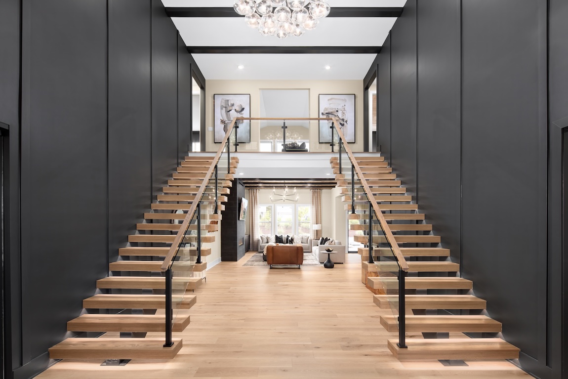 modern dual staircase with black walls