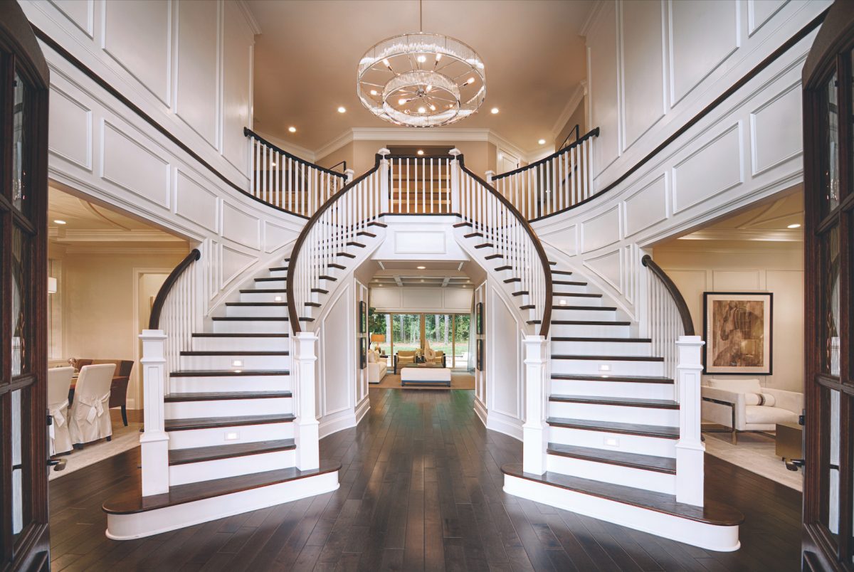 Dual staircase in the entryway of a house.