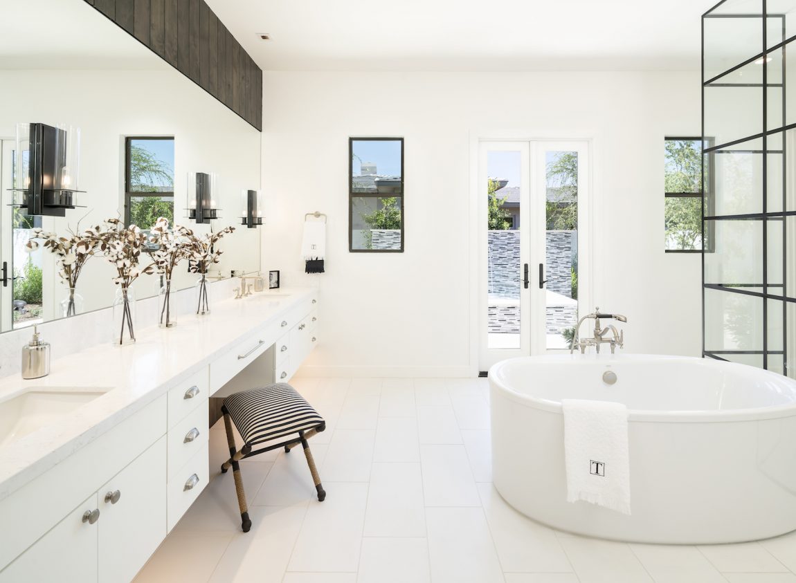 bathroom with white tile and floor
