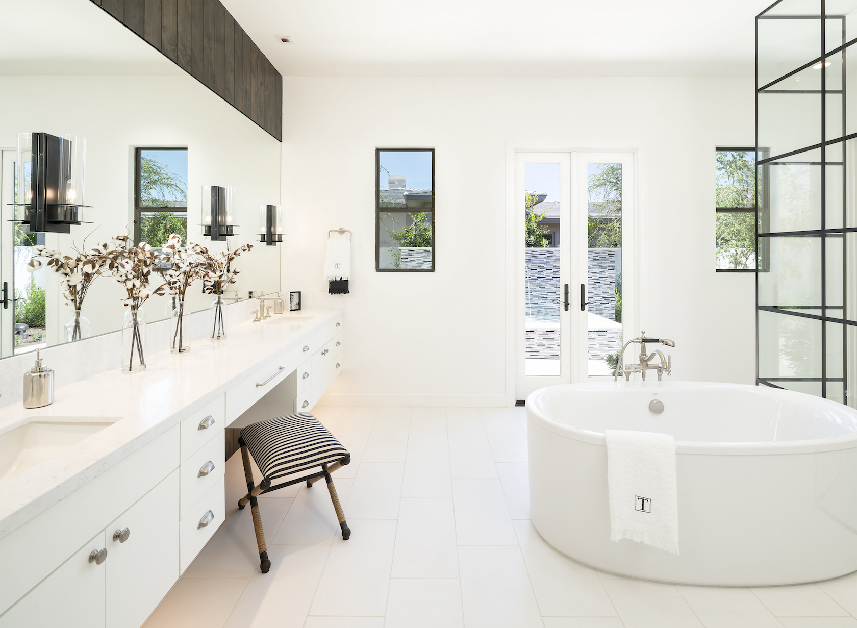 bathroom with white tile and floor