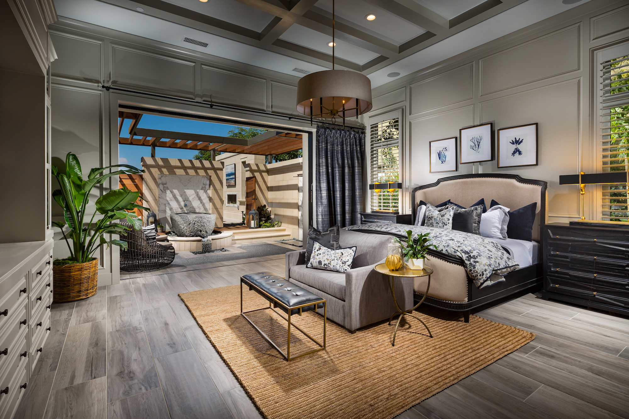 Bedroom in a California home with indoor and outdoor space.