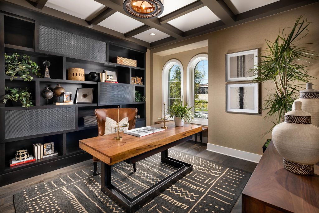 Home office with beige painted wall.