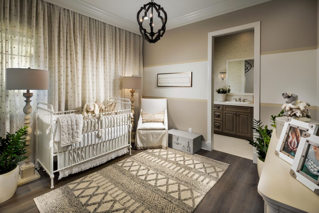 Nursery with painted wall.