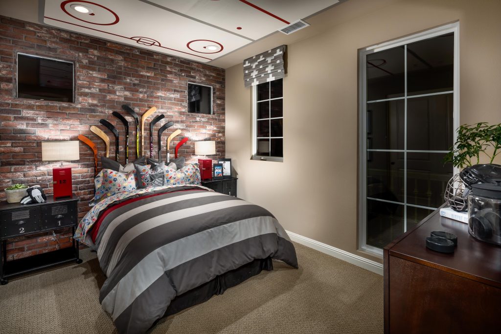 Teen bedroom with hockey theme design.