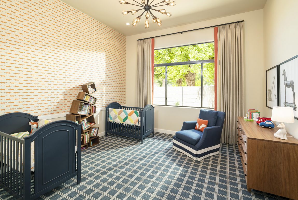 Baby room with beige color walls. 