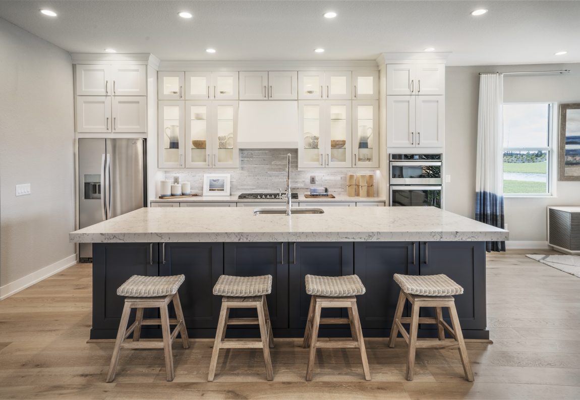 Modern kitchen with glass cabinets.