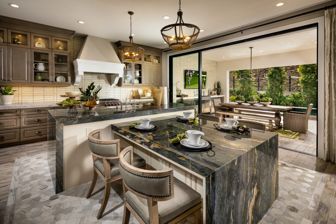 Luxury Kitchen & Sunroom with Two Islands Perpendicular of Each Other