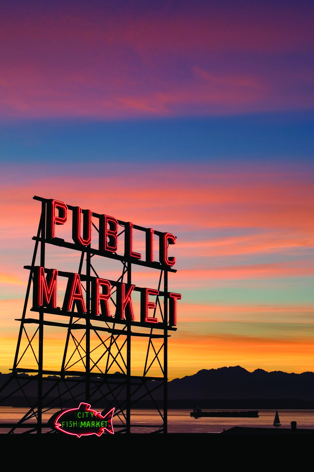 Public Market red neon sign at sunset