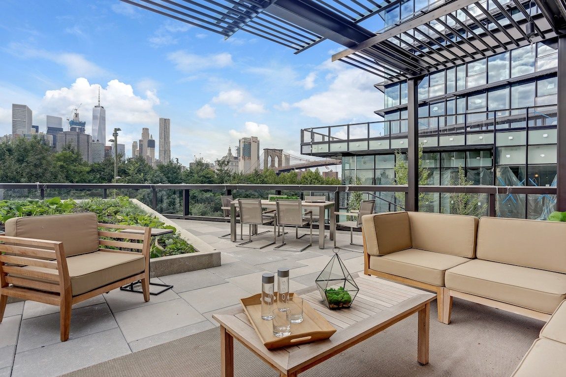 Outdoor seating area with city views. 