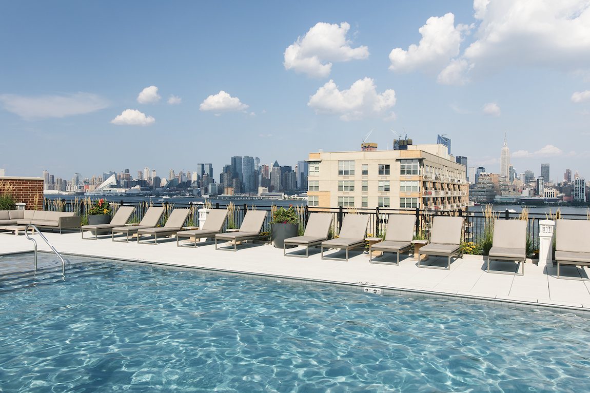 City living roof top pool and city view