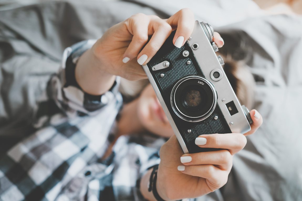 Person holding camera.