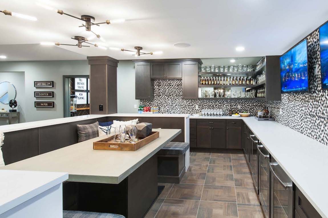 Basement kitchen and wet bar perfect for watching your favorite sports game. 