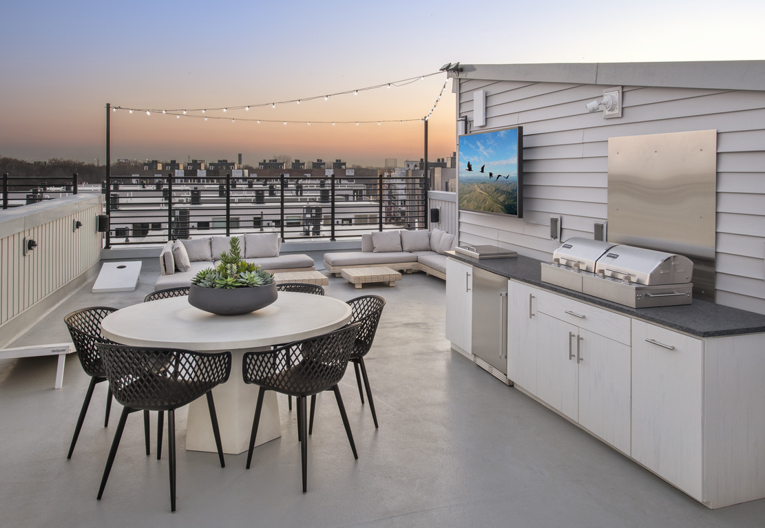 outdoor rooftop kitchen and entertainment space