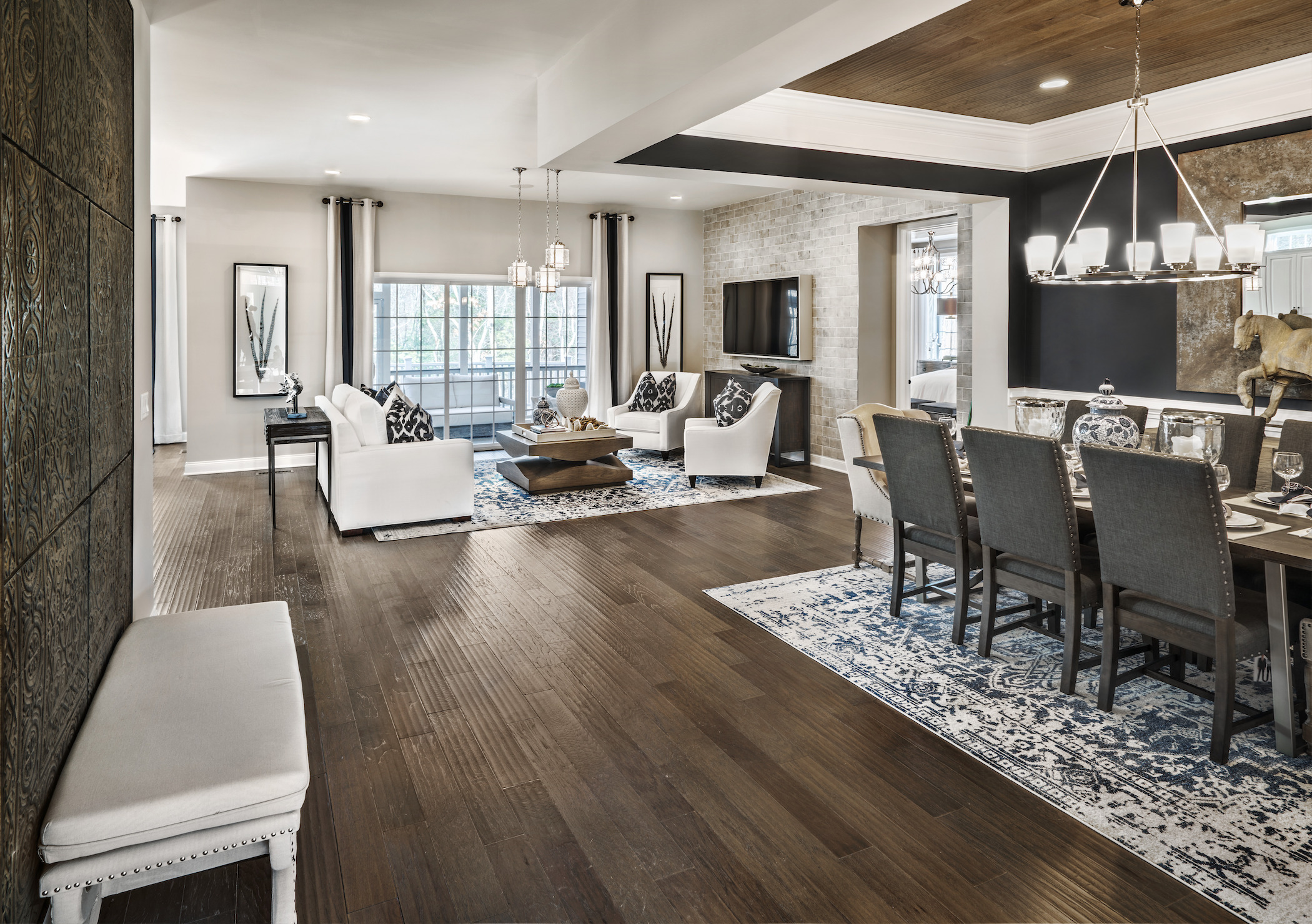 Open-concept space with beautiful hardwood flooring.