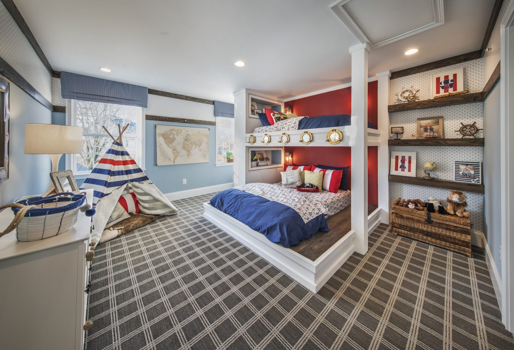 Inspiring kids bedroom featuring innovative bunk bed and geometric carpeting.