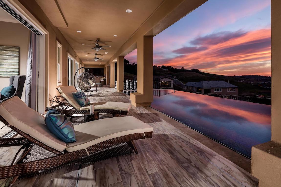 Lap pool with a view of the sunset.