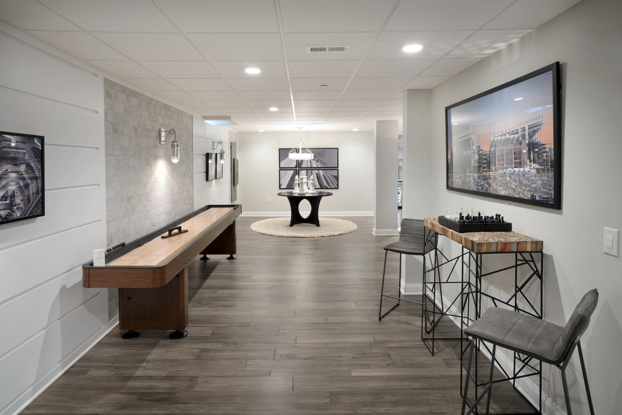 Entertaining space featuring shuffleboard and chess.