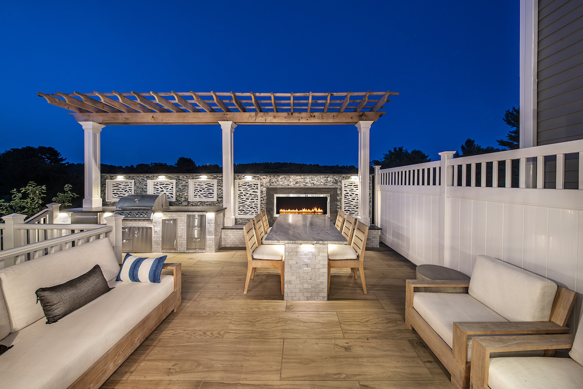 cutting-edge backyard patio with fireplace