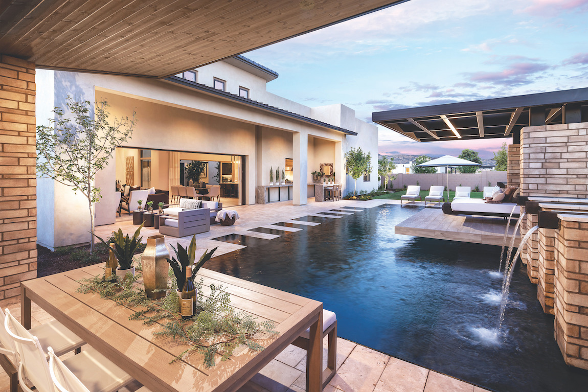 Gorgeous outdoor area with innovative pool design and lounge area