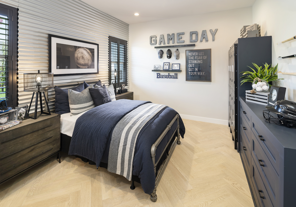 Football themed bedroom with sports memorabilia.