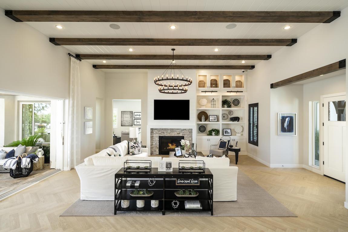Great room featuring beam ceiling