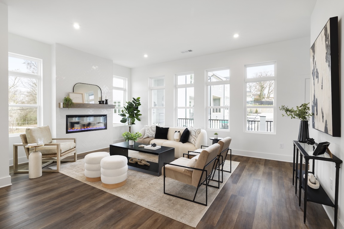great room with seating and fireplace