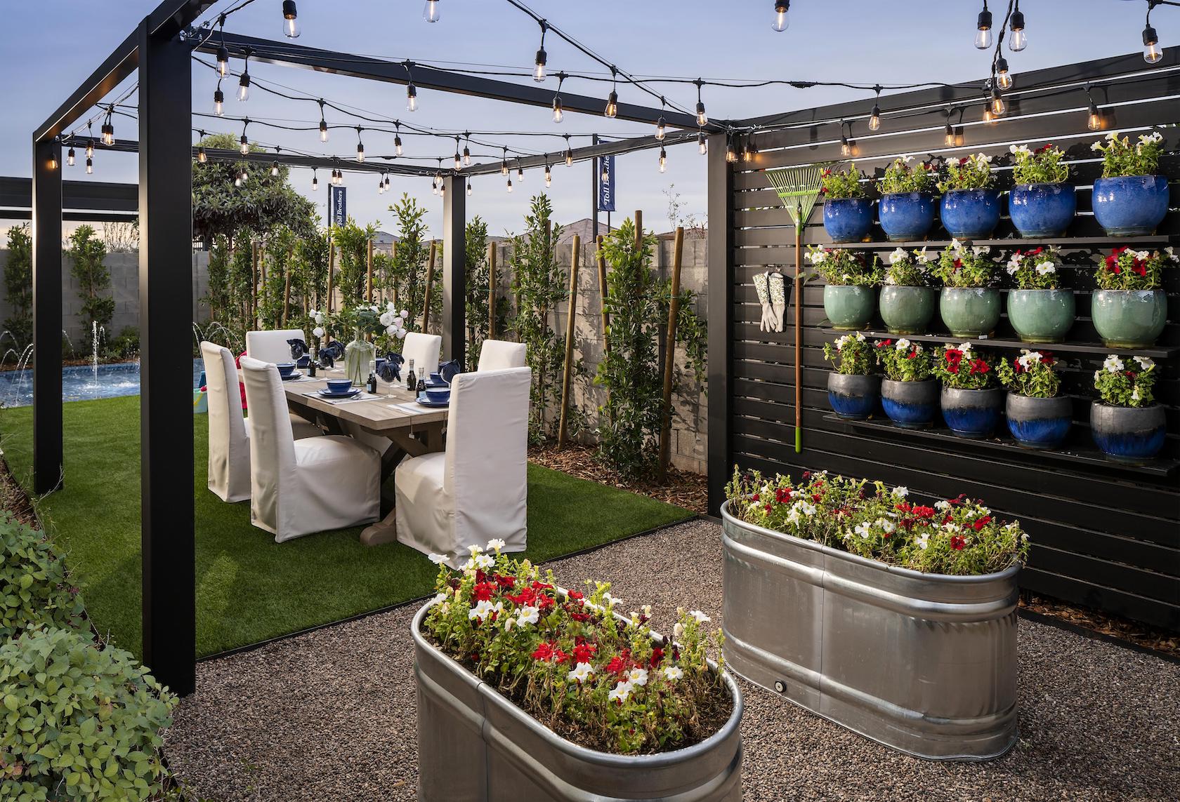 verdant outdoor dining area with string lights