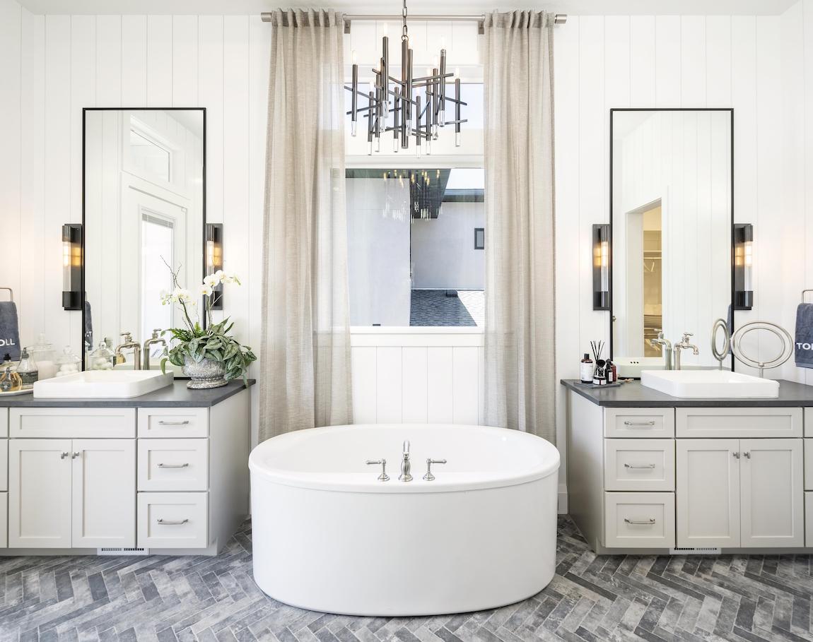 Luxury bathroom with vertical shiplap walls.
