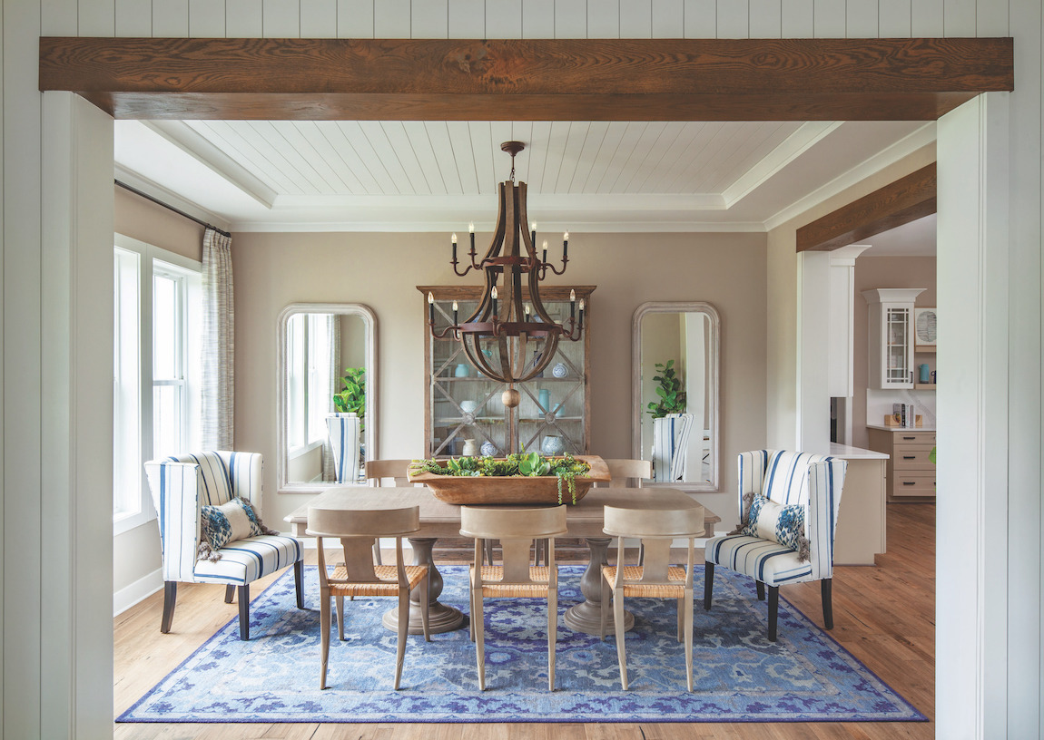 Traditional dining room with farmhouse-inspired shiplap ceiling.