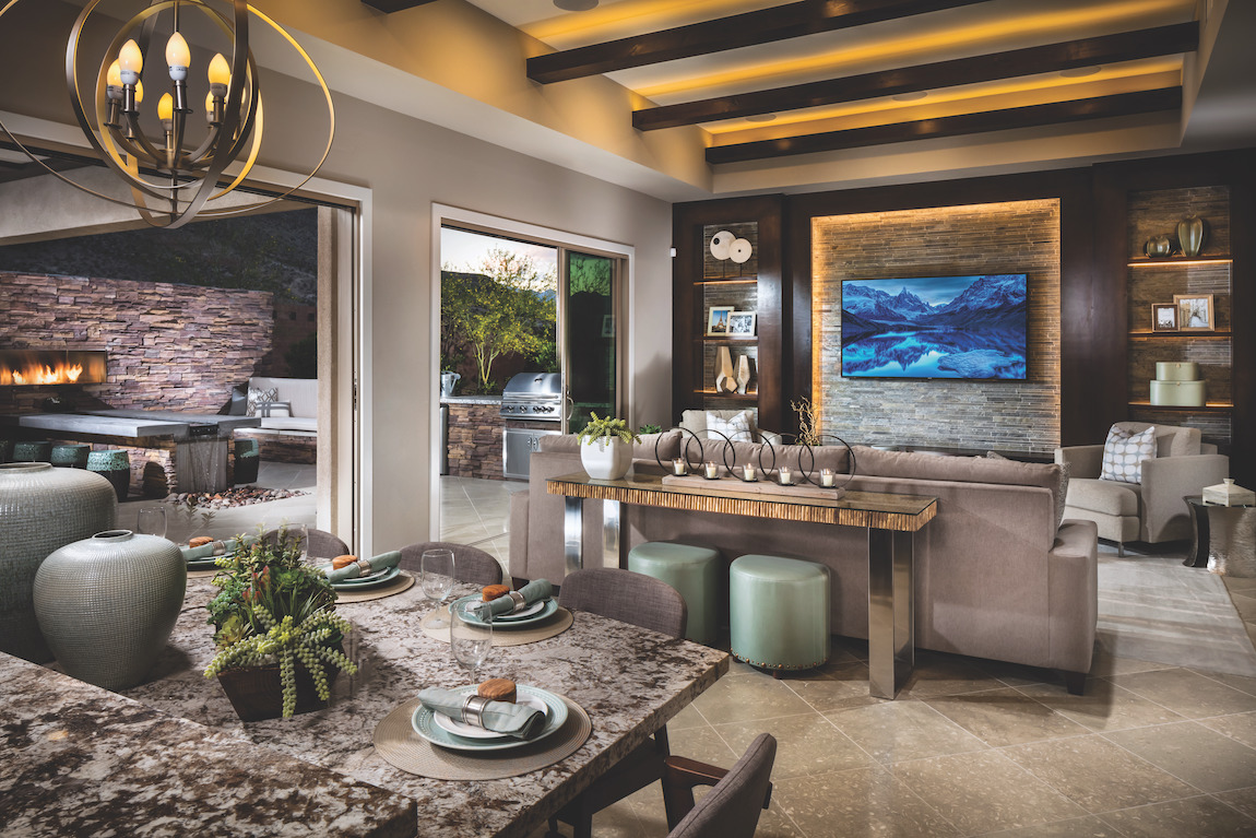Fall decor great room highlighted by Earthy tones and yellow ambient lighting