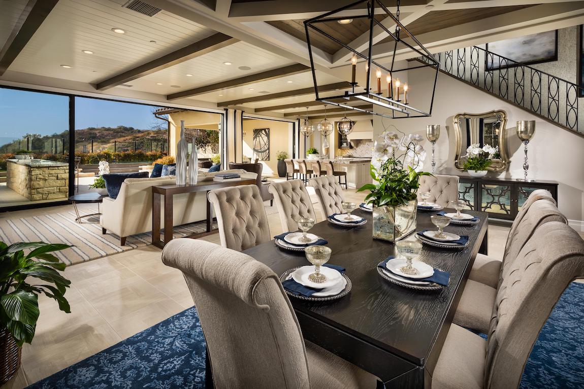 Luxe dining space full of flowers, foliage, and other ornate features