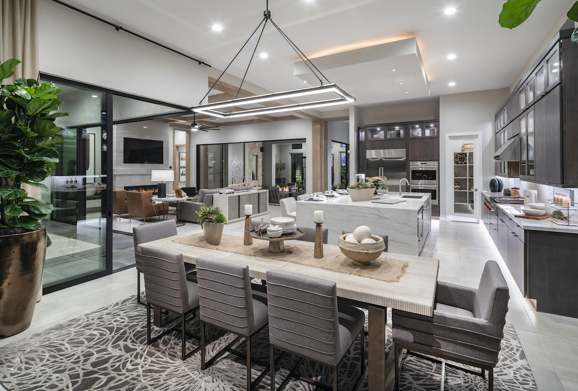 Open floor plan home design in Arizona with kitchen, dining room, and living room.