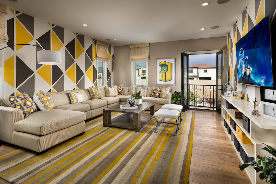 Luxe loft featuring geometric wallpaper with shades of yellow