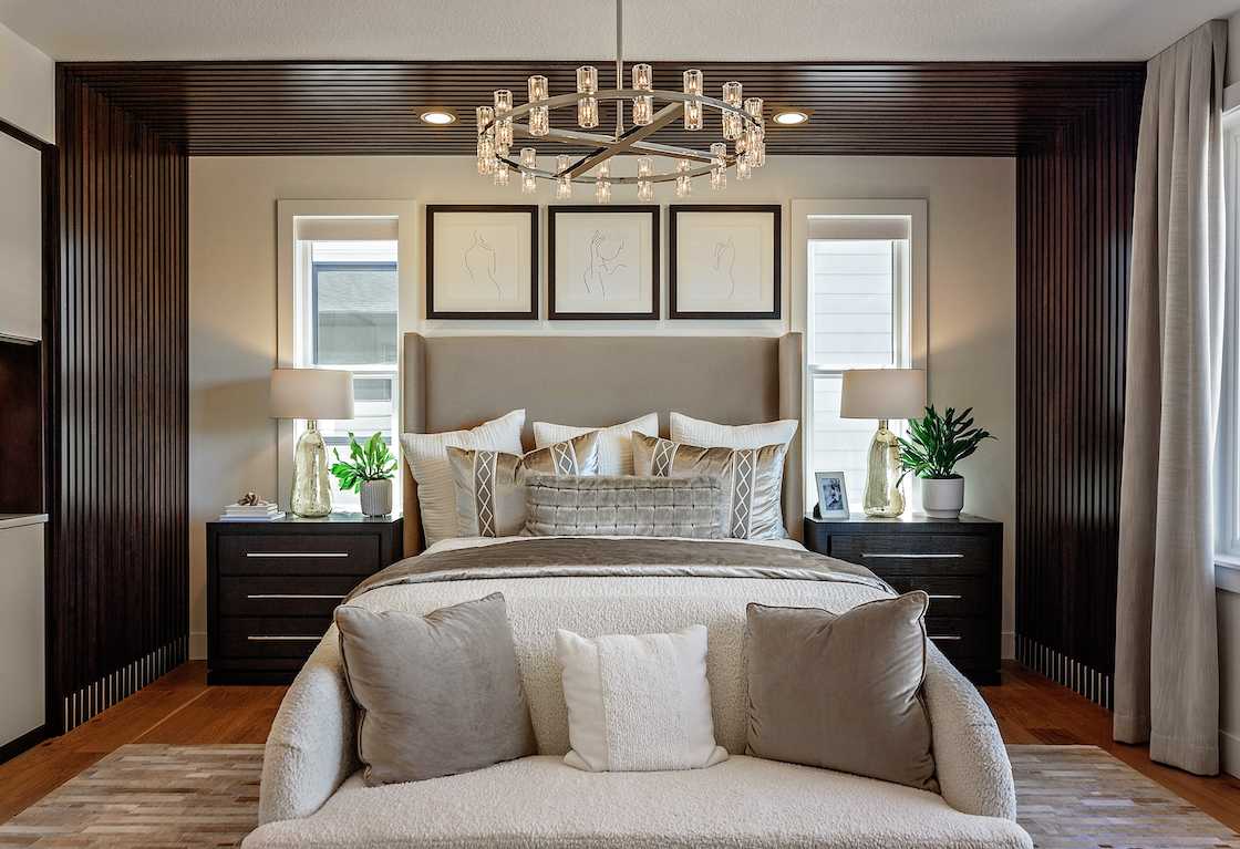 Bedroom with dark wood bedroom trim that extends from wall to ceiling