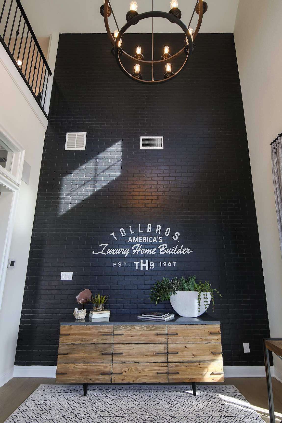 Painted brick chalk wall in entry.