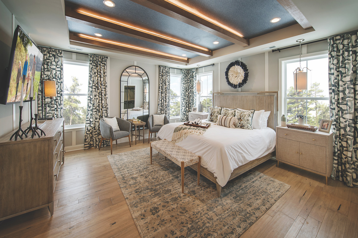 Master bedroom featuring stunning accent ceiling