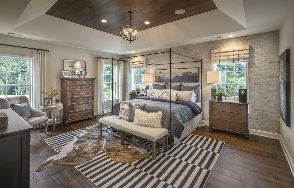 Master bedroom highlighted by recessed accent ceiling