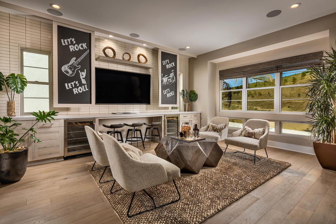 A home bar with multiple seating and wine storage.