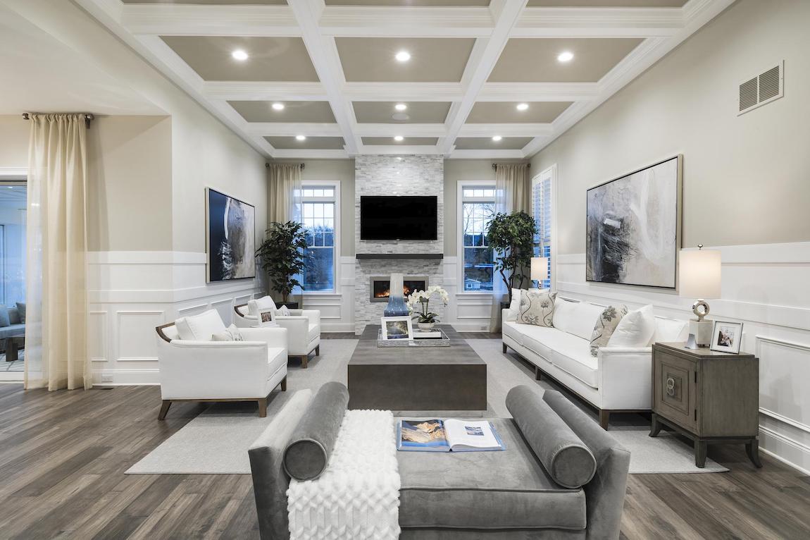 great room with coffered ceiling