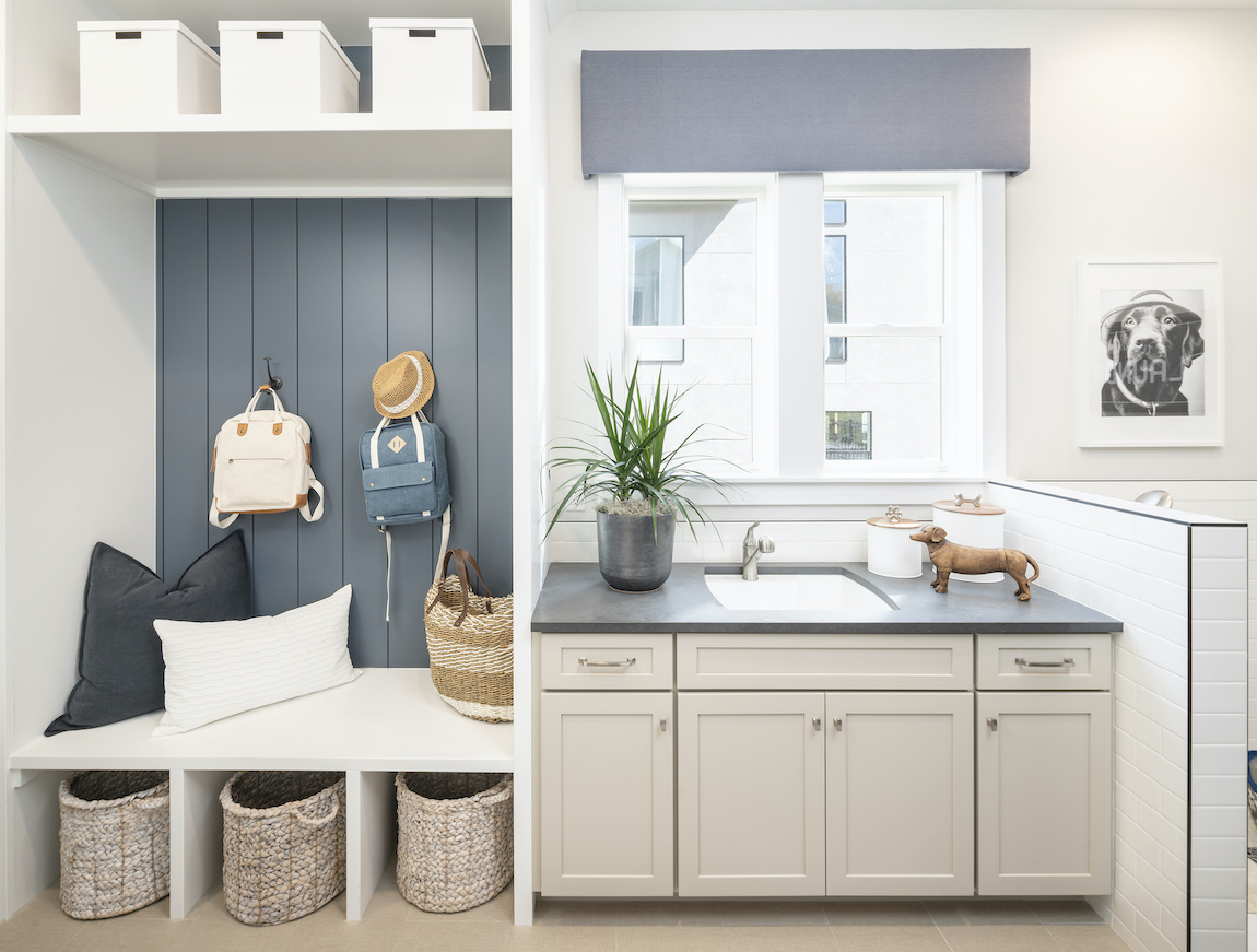 Utah home with modern farmhouse mudroom laundry room.