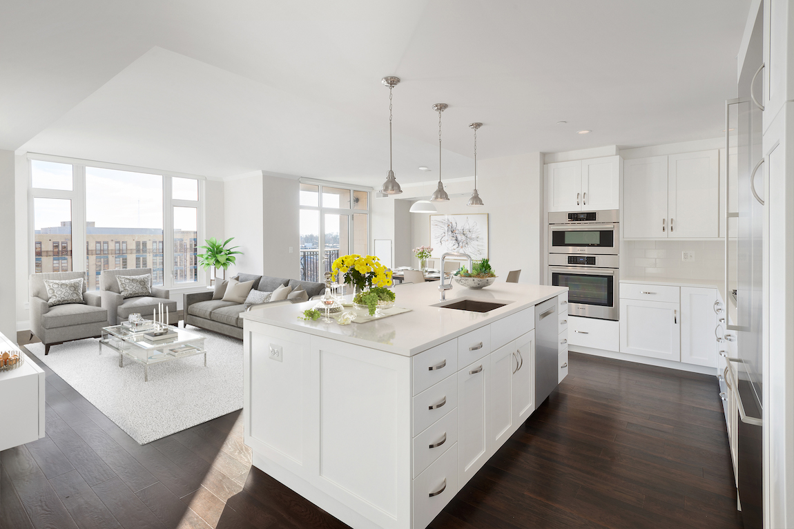 Light and airy kitchen filled with natural lighting and interior plants