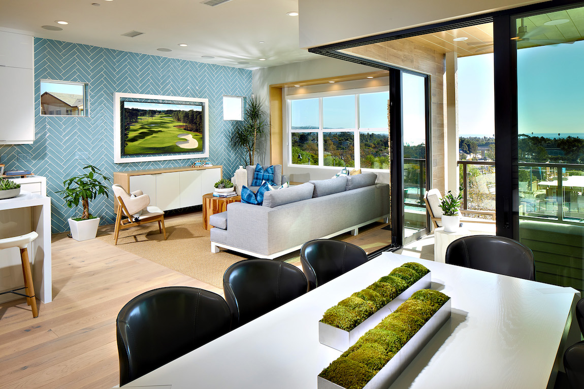 Gorgeous living room highlighted by vibrant colors and natural elements