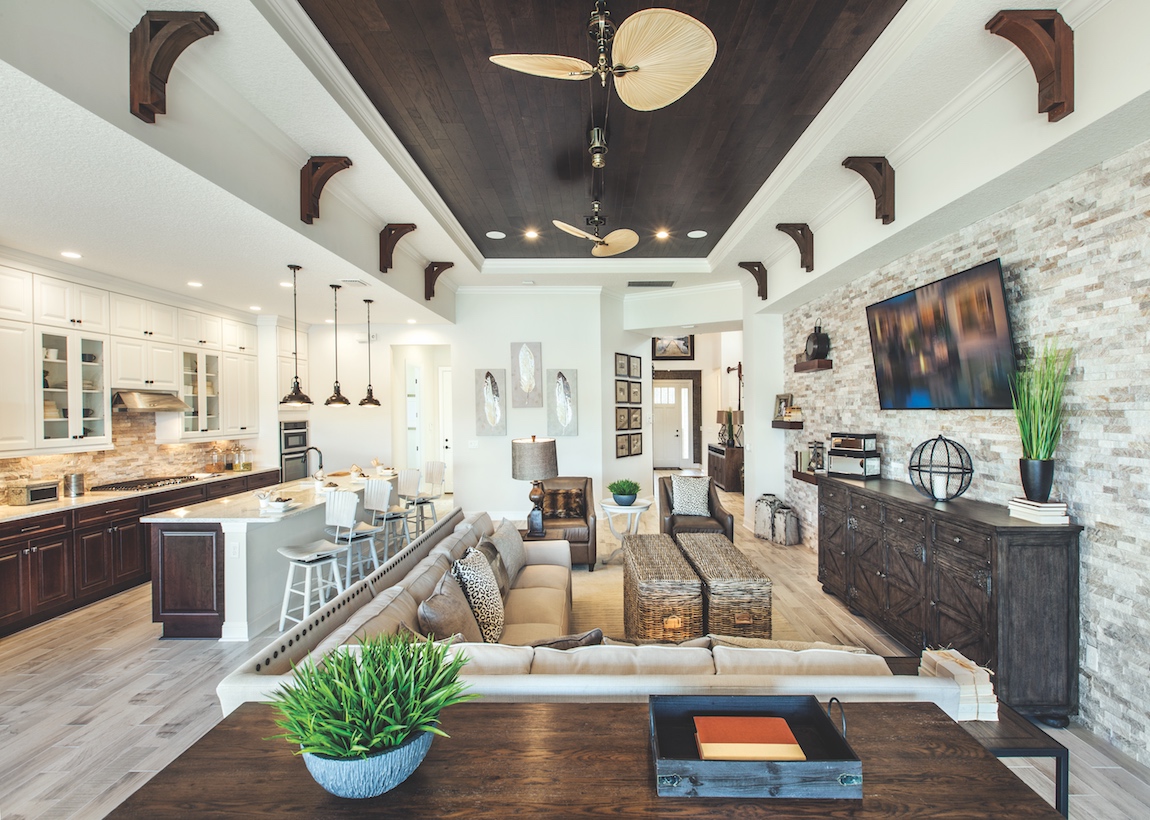 Living room and kitchen in a Toll Brothers Captiva model in Florida.