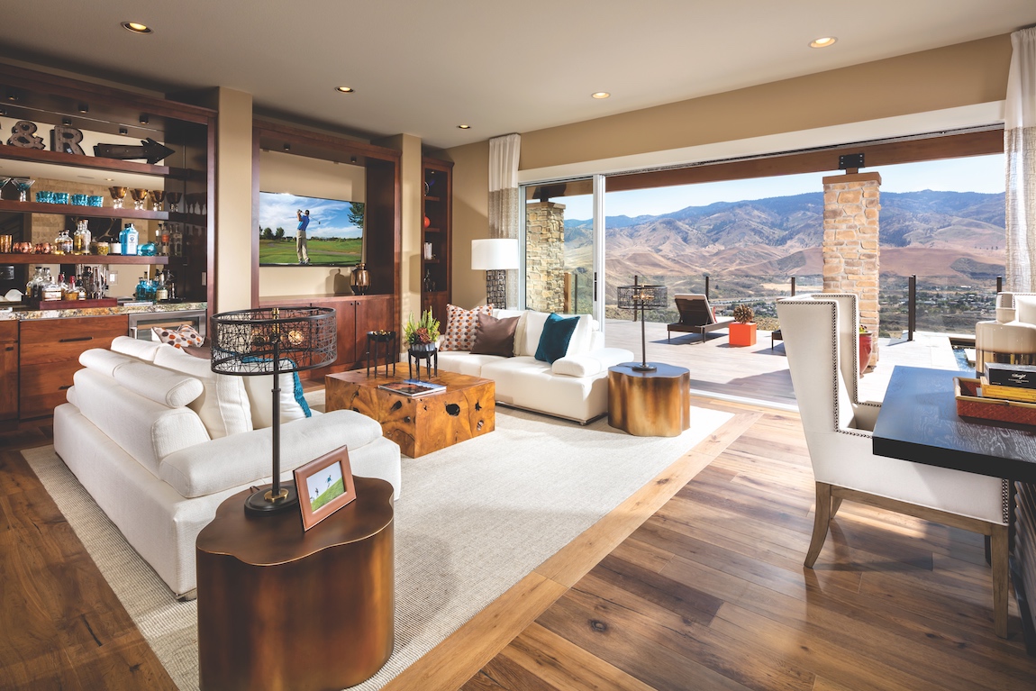 Open concept Toll Brothers model home overlooking mountains in Nevada. 