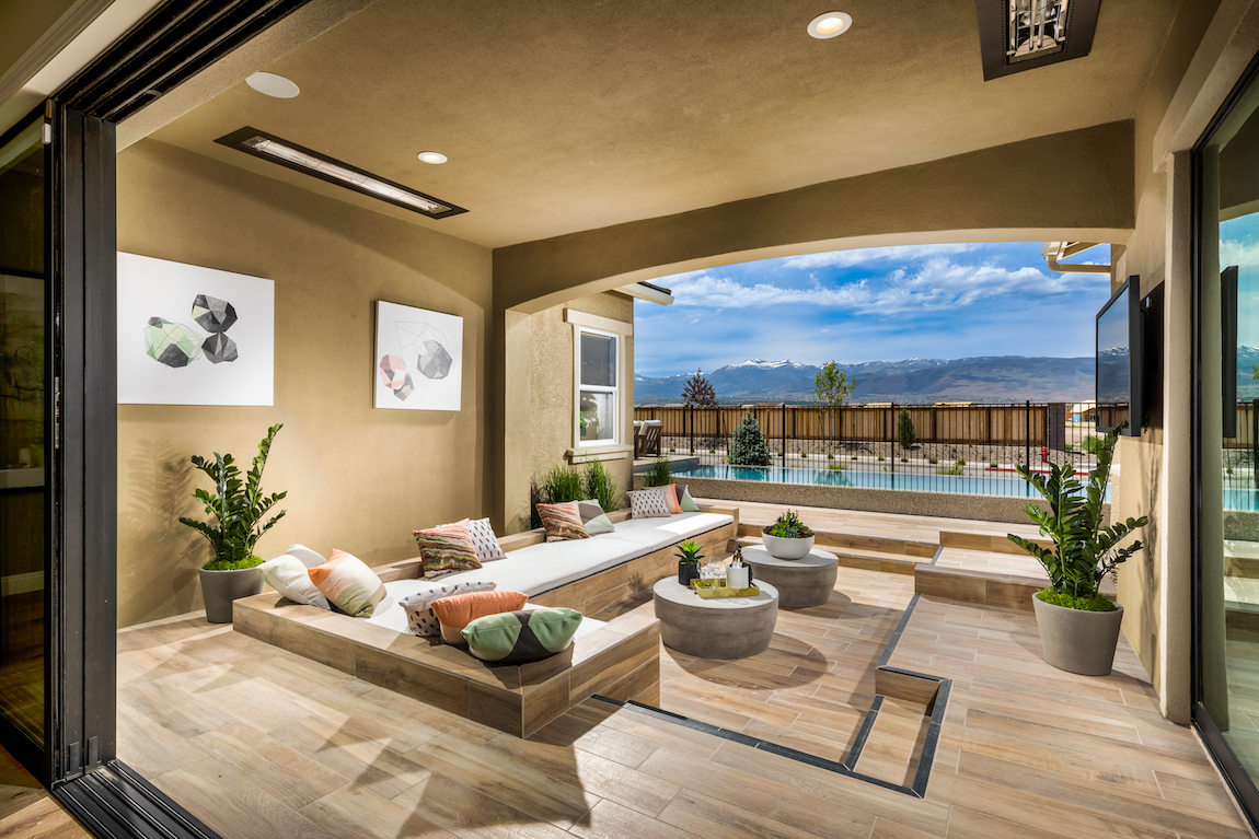 A patio in a luxury Toll Brothers home in Nevada overlooking mountains. 