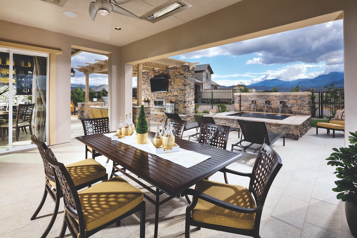 Outdoor living space in a Toll Brothers model home with a view of mountains in Nevada. 